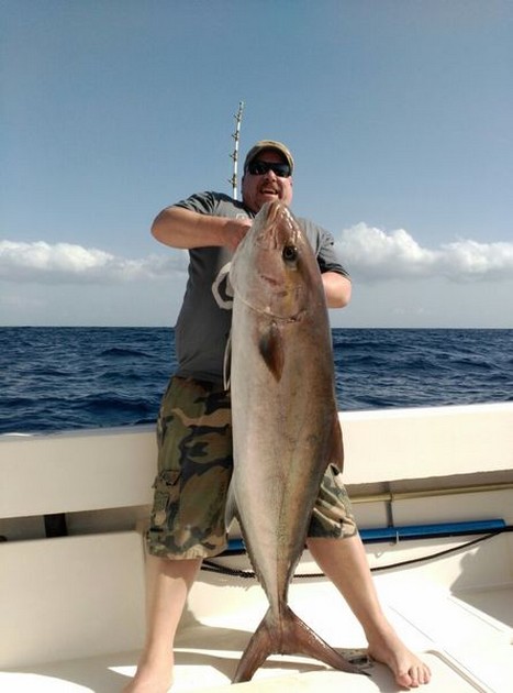 28 kg Amberjack - Juha Lindqvist shows his Amberjack on the boat Cavalier Cavalier & Blue Marlin Sport Fishing Gran Canaria