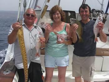 satisfied fishermen Cavalier & Blue Marlin Sport Fishing Gran Canaria
