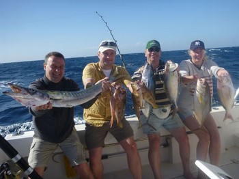 Congratulations - Happy anglers onboard of the boat Cavalier Cavalier & Blue Marlin Sport Fishing Gran Canaria