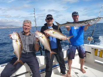 Pescadores satisfechos: pescadores satisfechos a bordo del Cavalier Pesca Deportiva Cavalier & Blue Marlin Gran Canaria