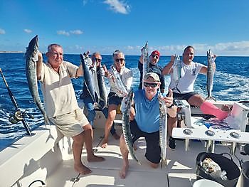 Mooie vangst, gefeliciteerd mannen. Cavalier & Blue Marlin Sport Fishing Gran Canaria